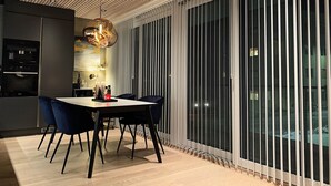 Deluxe Apartment | Living area | Flat-screen TV - Arctic Homes (Tromsø)