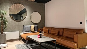 Deluxe Apartment | Living area | Flat-screen TV - Arctic Homes (Tromsø)