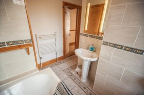 Combined shower/tub