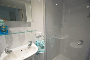 Combined shower/tub