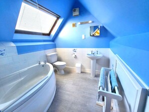 Combined shower/bathtub