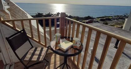 A 2-bedroom seafront apartment in a large detached property on seafront