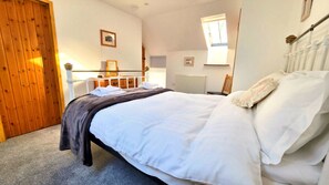 4 habitaciones, acceso a internet y ropa de cama