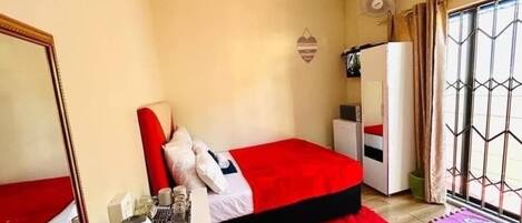 Elite Room | Premium bedding, down comforters, individually decorated