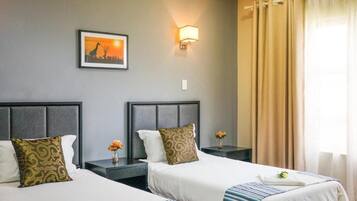 Minibar, desk, laptop workspace, blackout curtains