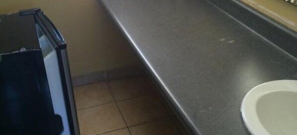 Bathroom sink - Travelers Inn (Okeechobee)