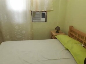 Studio Aircon Room | Individually decorated, individually furnished, bed sheets