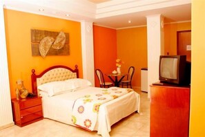 Desk, laptop workspace, free WiFi, bed sheets