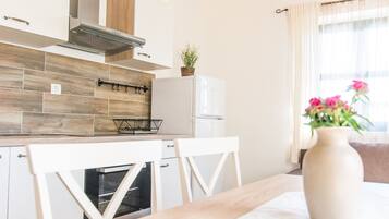 Apartment (A2) | Private kitchen | Stovetop, electric kettle