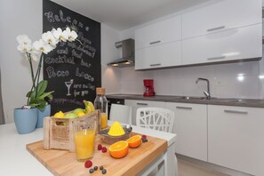 Apartment (A1) | Private kitchen | Fridge, stovetop, espresso maker, coffee/tea maker - Apartments Turritella (Biograd na Moru)
