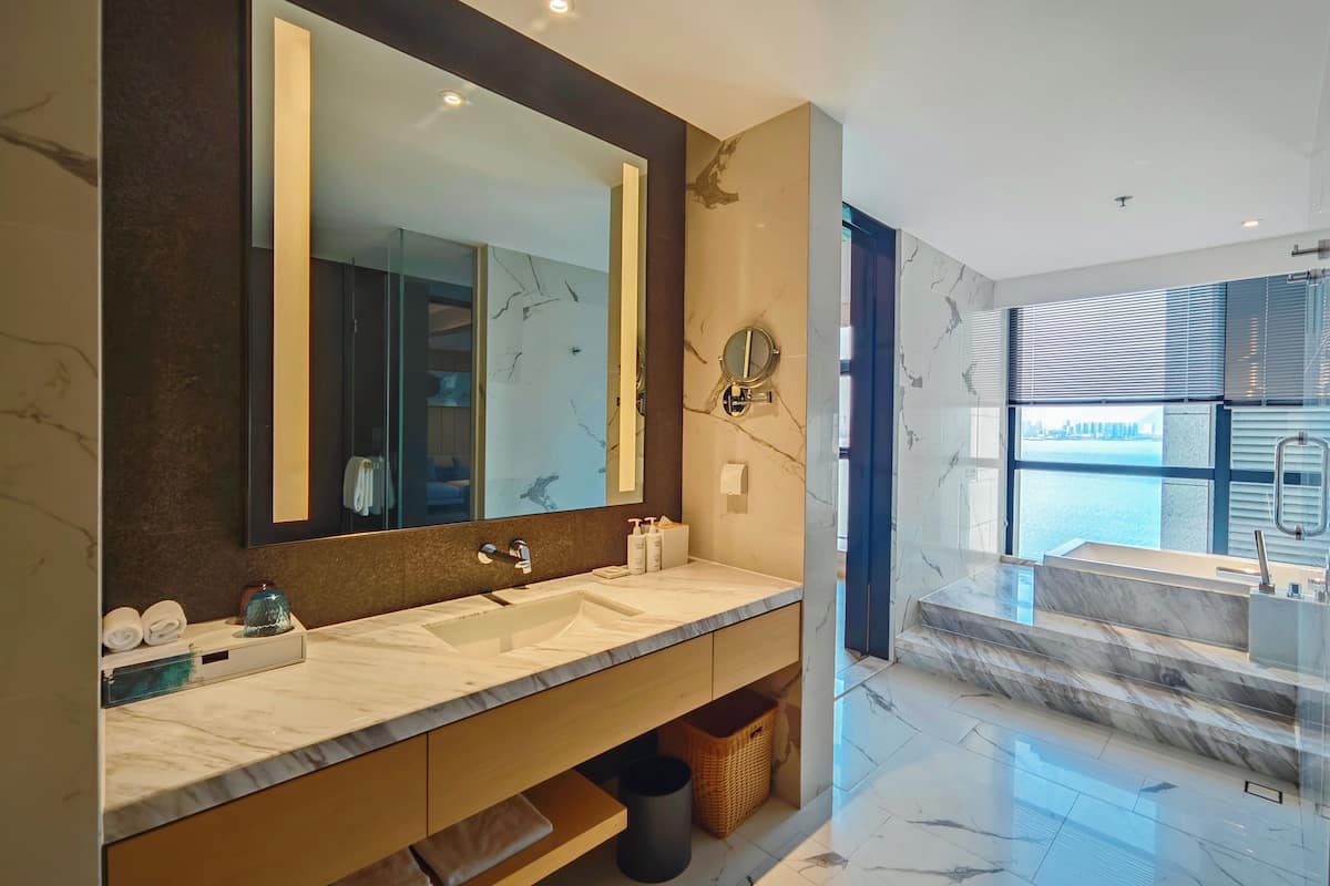 premier room, 1 king bed, sea view | 1 bedroom, minibar, laptop workspace, iron/ironing board