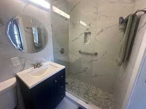 Shower, hair dryer, bathrobes, towels