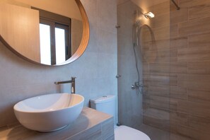 Villa, alberca privada | Lavabo en el baño