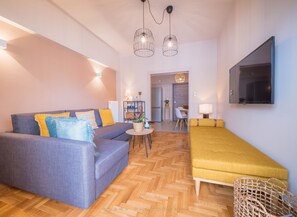 Apartment | Living area | 42-inch flat-screen TV with satellite channels, TV - Brand new apartment touching Acropolis (Athens)