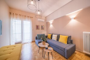 Apartment | Living area | 42-inch flat-screen TV with satellite channels, TV - Brand new apartment touching Acropolis (Athens)