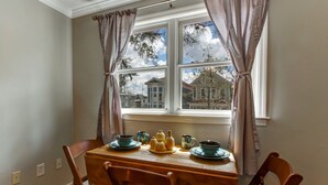 Condo, 2 Bedrooms | In-room dining - Vibrant, Colorful Condo Building With Backyard Firepit and Games (Savannah)