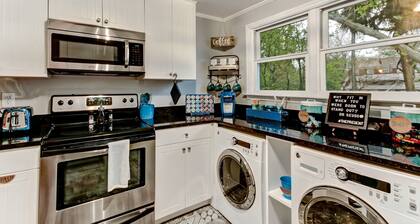 Vibrant, Colorful Condo Building With Backyard Firepit and Games