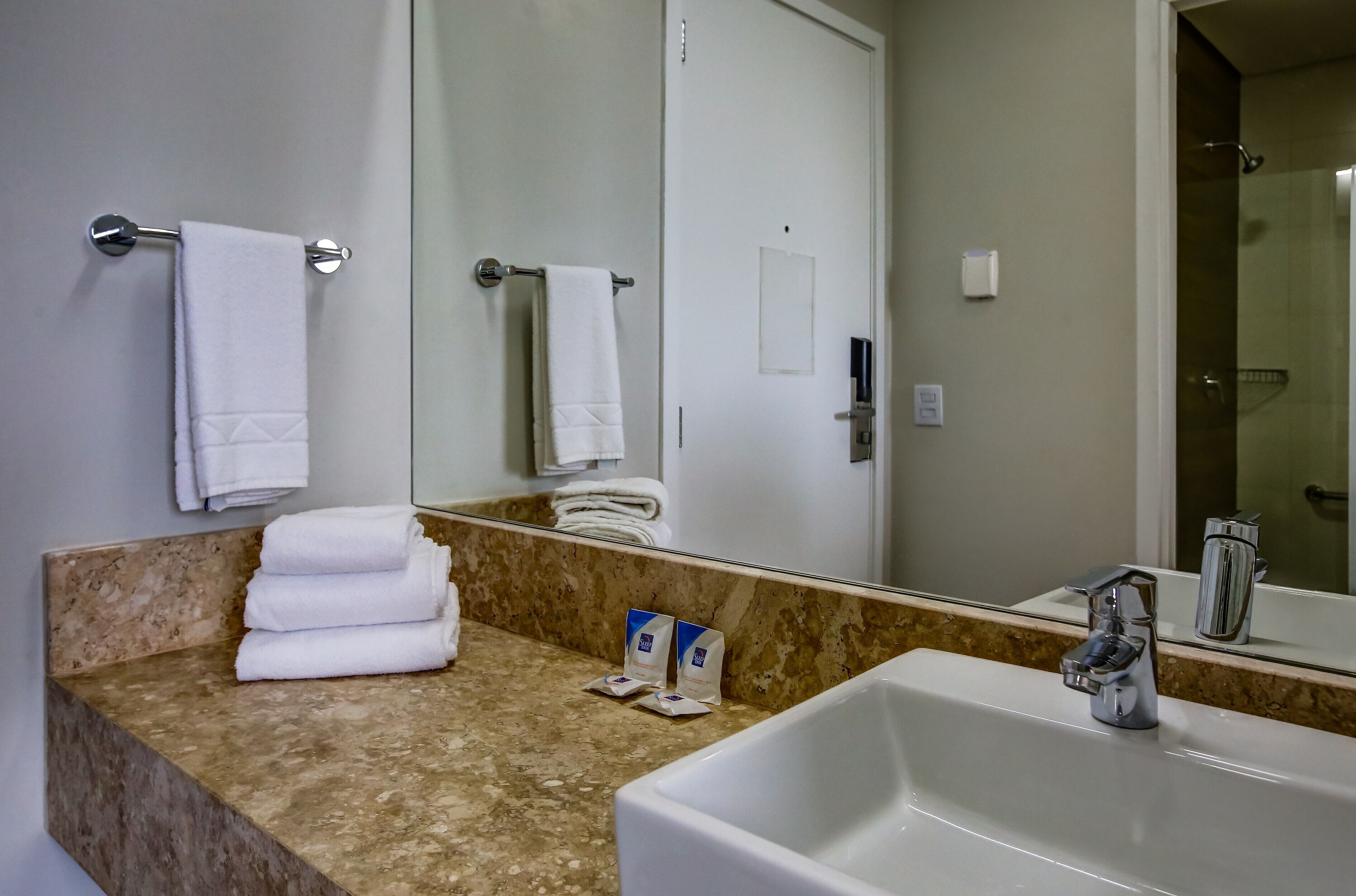 shower, free toiletries, hair dryer, towels