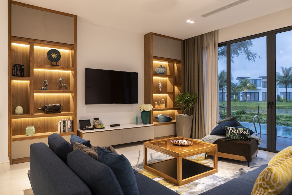 villa, 3 bedrooms, private pool, lake view | living area | 42-inch smart tv with cable channels, tv, dvd player