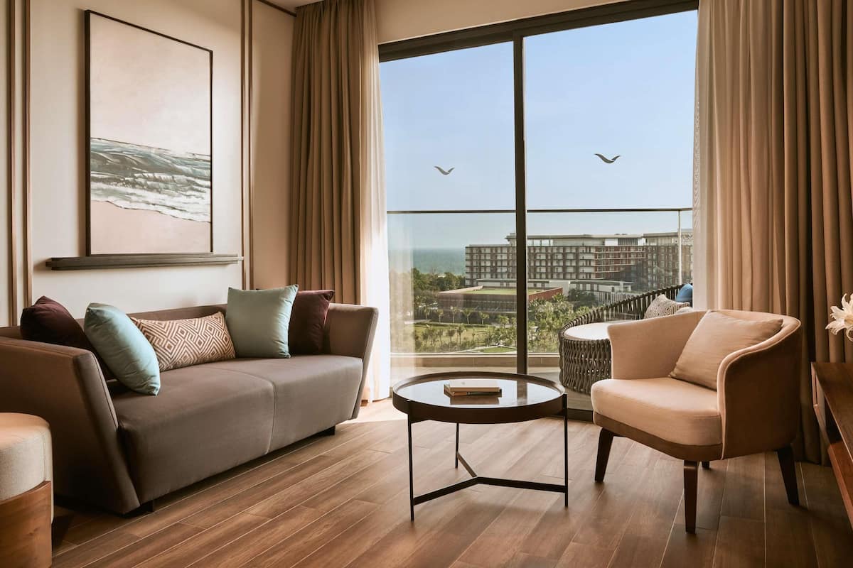 Apartment, 2 Bedrooms, Sea View | Minibar, in-room safe, desk, laptop workspace