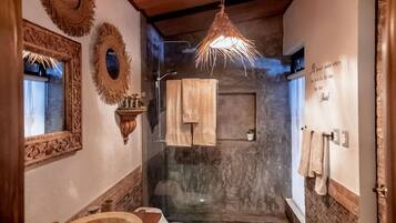 Shower, towels, soap, toilet paper