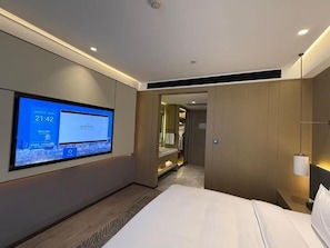 Deluxe Room, 1 King Bed | Down comforters, minibar, in-room safe, blackout drapes