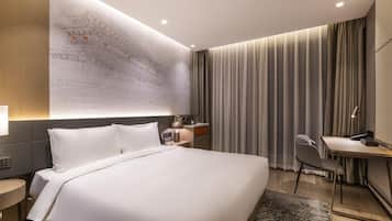 Down duvets, minibar, in-room safe, blackout curtains