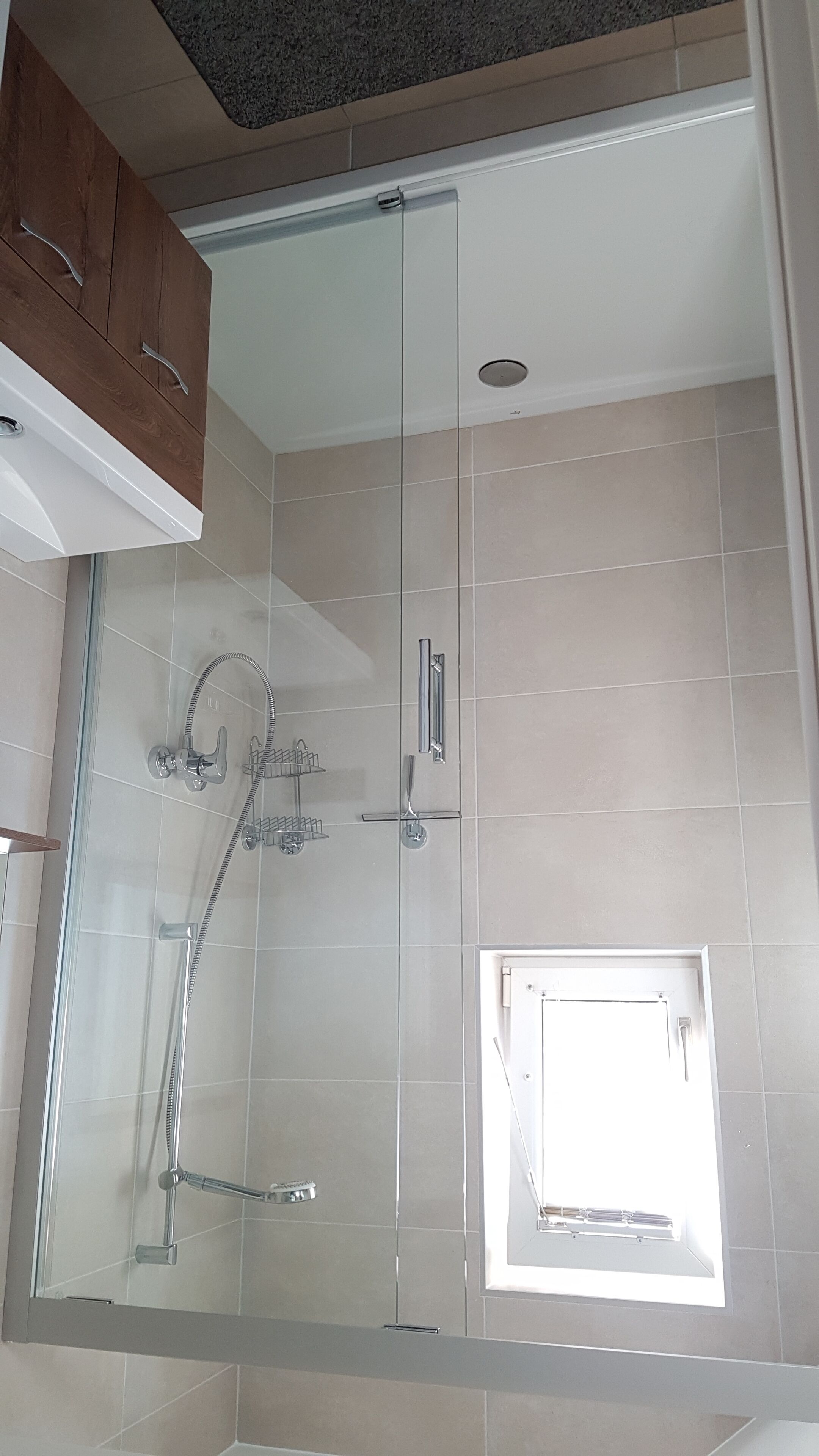 Shower, hair dryer, towels, toilet paper
