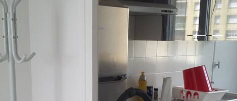 Fridge, oven, dining tables