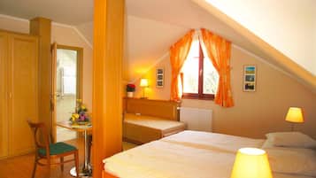 Bedden met traagschuimmatras, een minibar, een kluis op de kamer