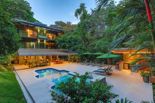 Jungle Roost, a beautifully appointed 4 story jungle house close to the beach