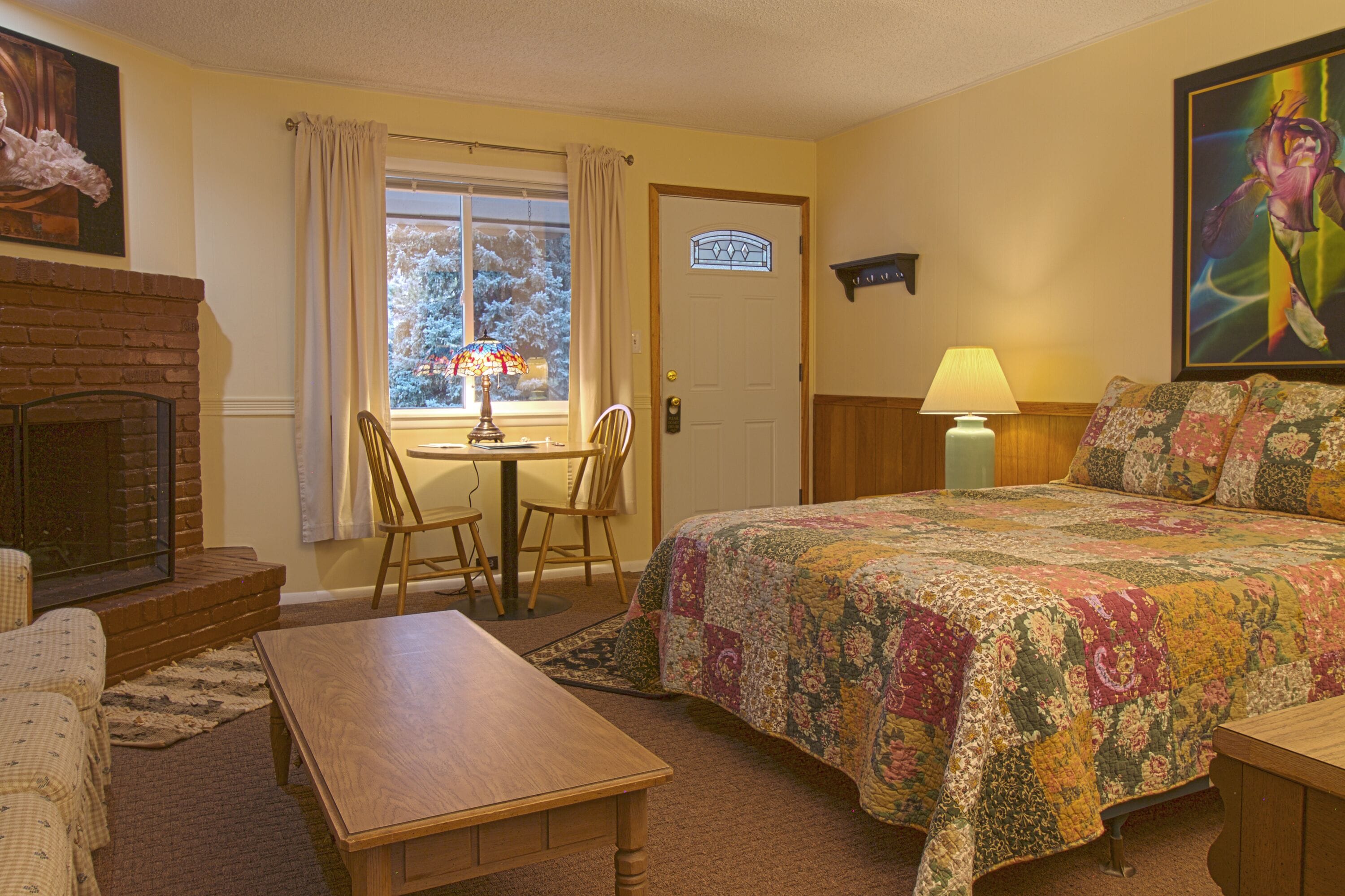 basic suite #11 | living area | 40-inch flat-screen tv with satellite channels, tv