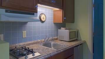 Suíte premium | 1 quarto, escrivaninha, ferros/tábuas de passar roupa, Wi-Fi de cortesia