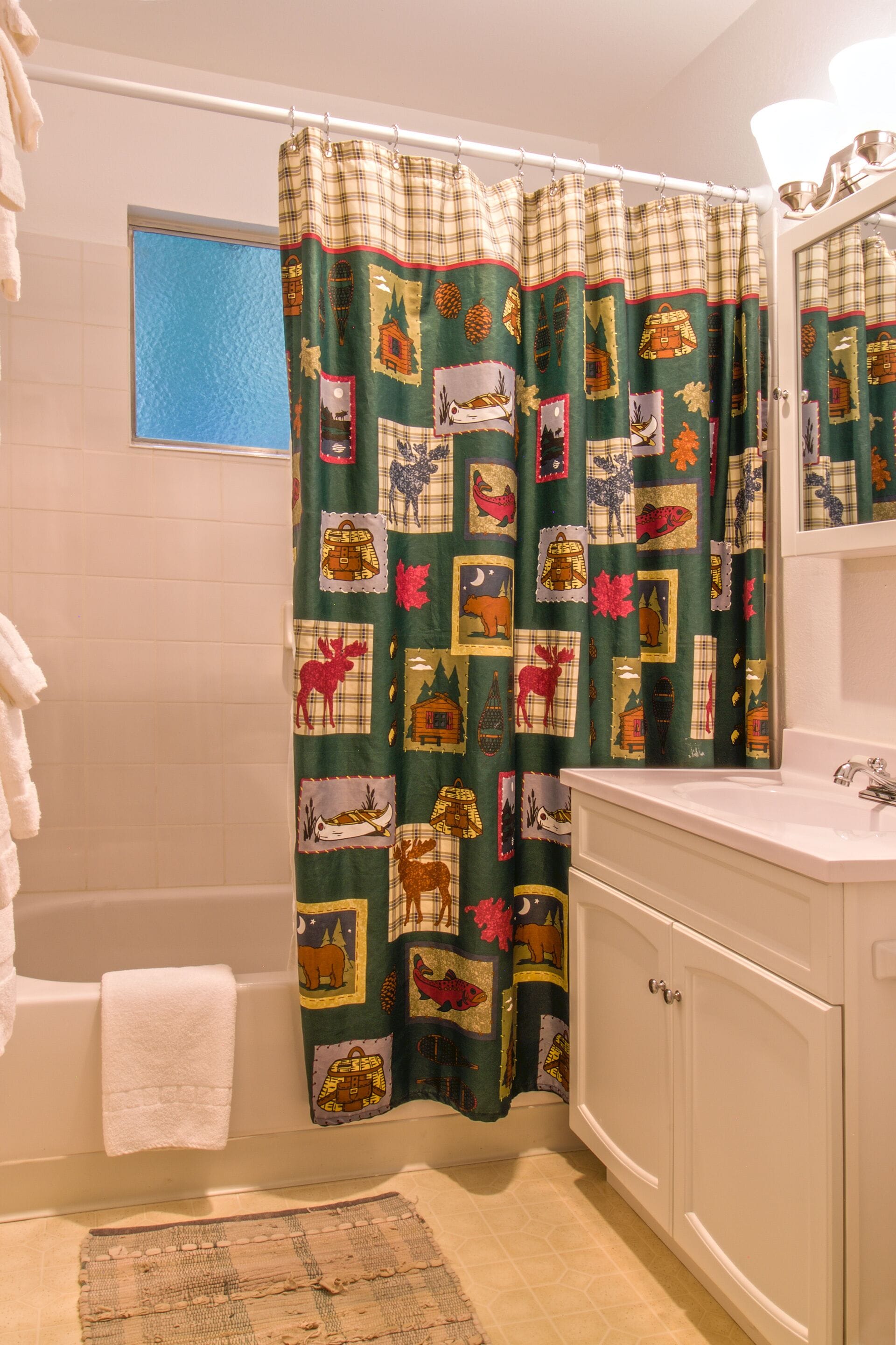 superior suite #9 | bathroom | combined shower/bathtub, free toiletries, hair dryer, towels