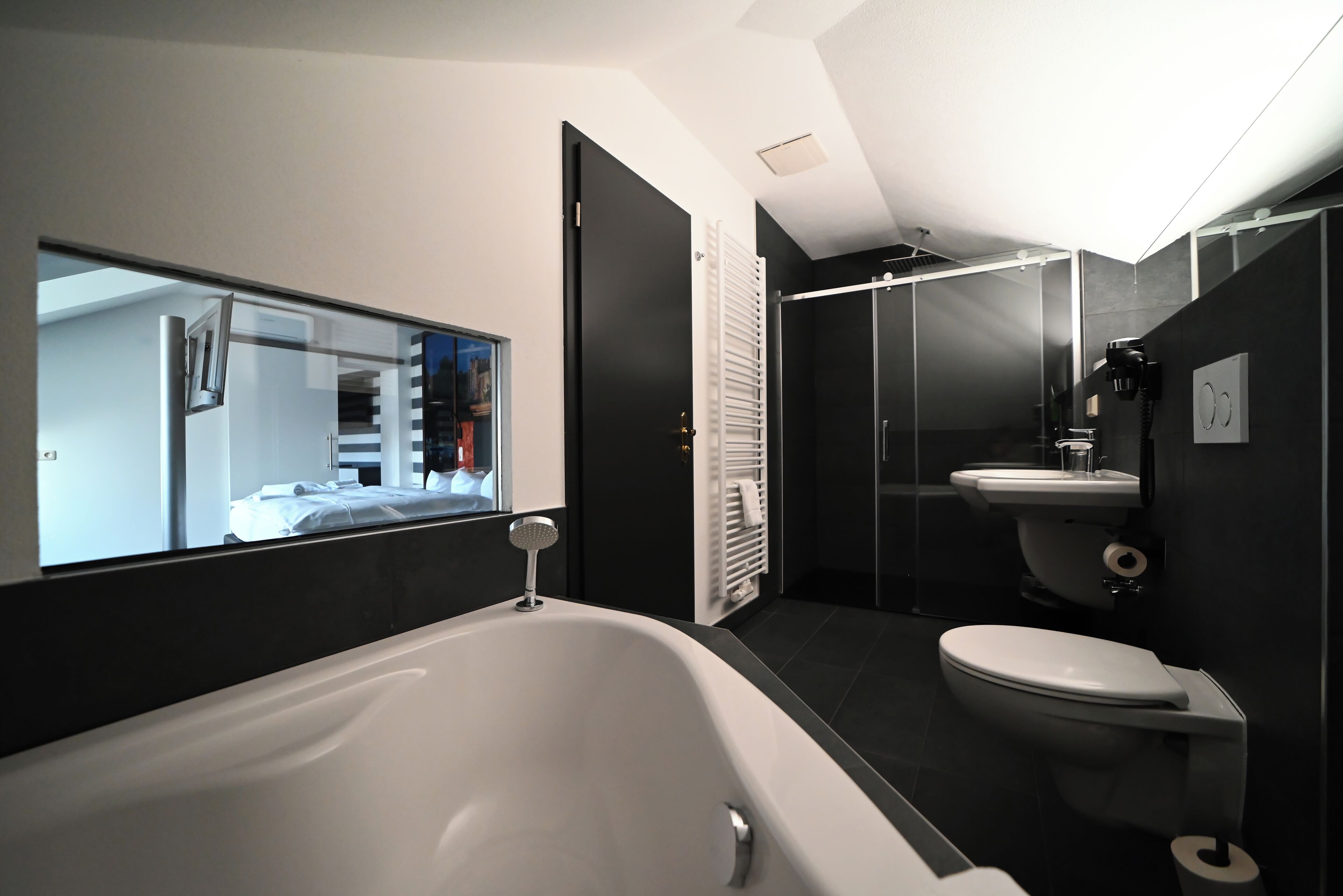superior apartment | bathroom | shower, hair dryer, towels, soap