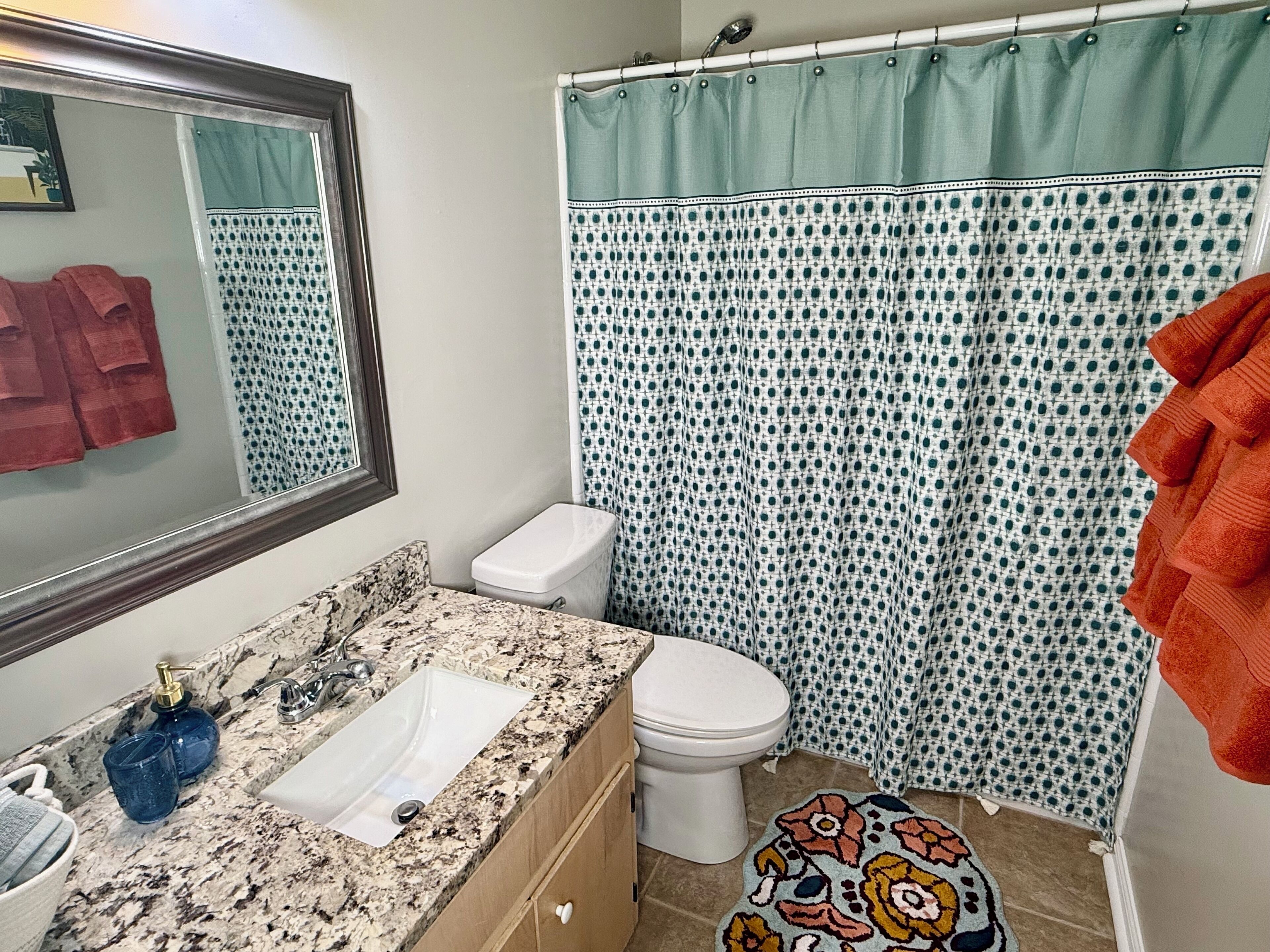 Combined shower/tub, hair dryer, towels, soap