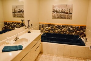 Shower, jetted tub, hair dryer, towels