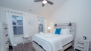 A bedroom with a bed, bedside tables, a ceiling fan, and a window with blinds. - *2bd/2.5bth | Near Downtown| Soccer Stadium* #D (Nashville)