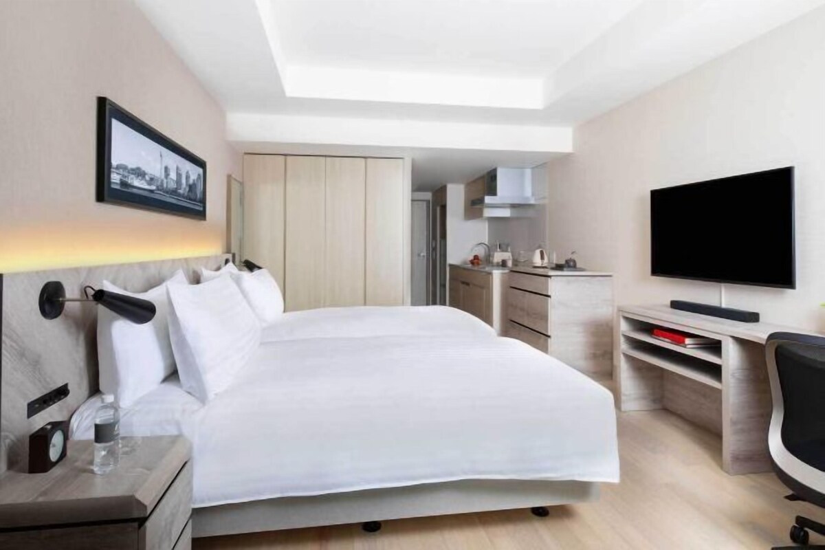 Premium bedding, down duvets, in-room safe, desk