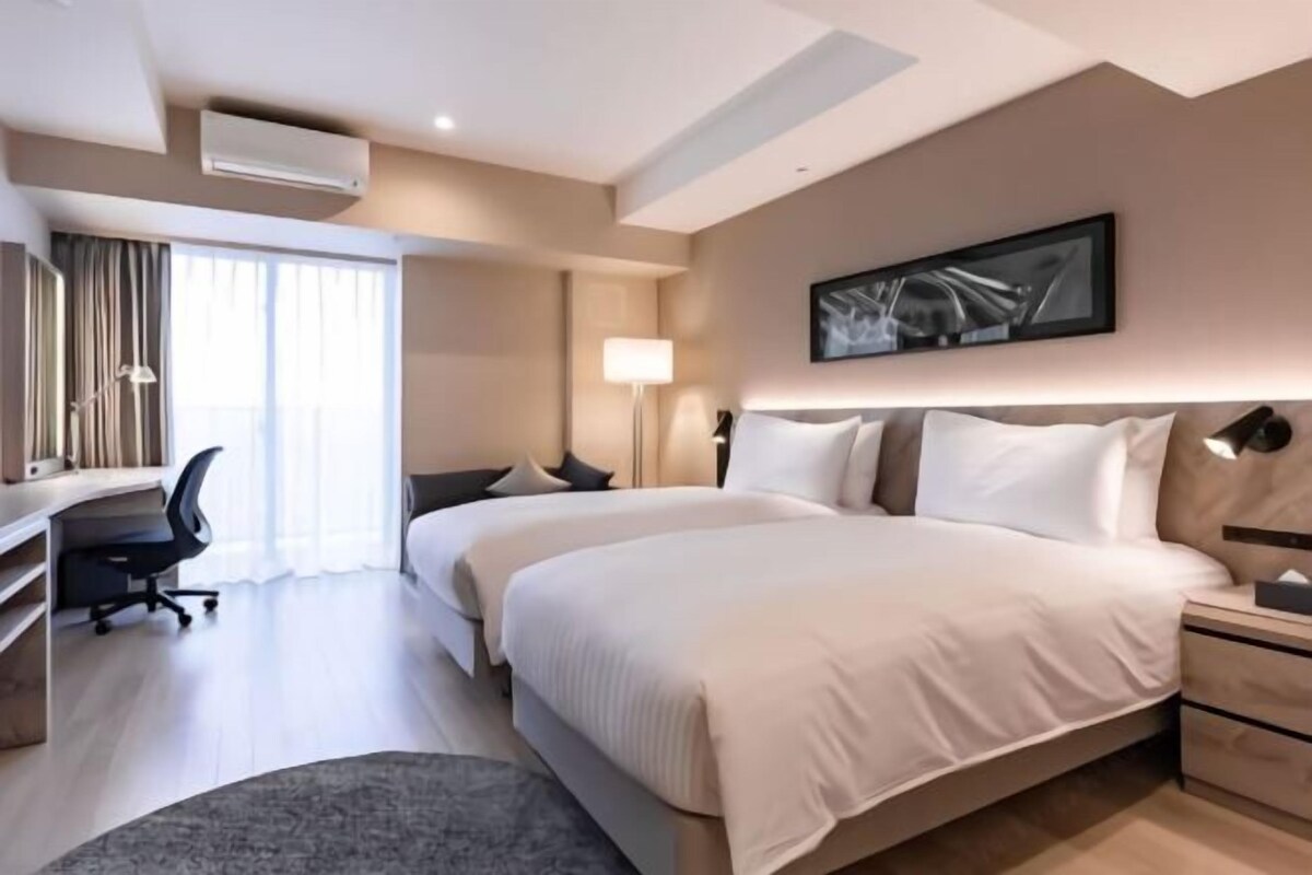 Premium bedding, down duvets, in-room safe, desk