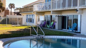 A pool area with a sign indicating a 5 ft 6 in depth.
