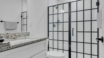 Bathtub, hair dryer, towels