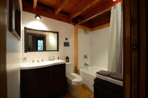 Combined shower/tub, hair dryer, towels, soap