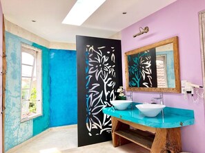 Shower, hair dryer, towels, soap