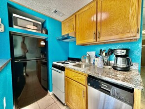 Fridge, microwave, stovetop, coffee/tea maker