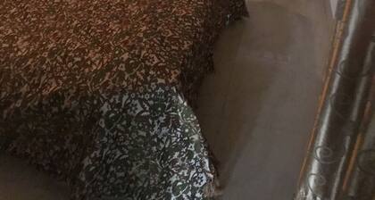 Cozy private room fully air conditioned attached bath.