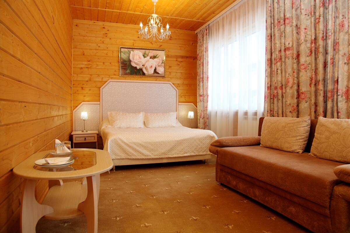 Suite Junior (Wooden Cottage) | 1 camera, minibar, una scrivania, ferro/asse da stiro