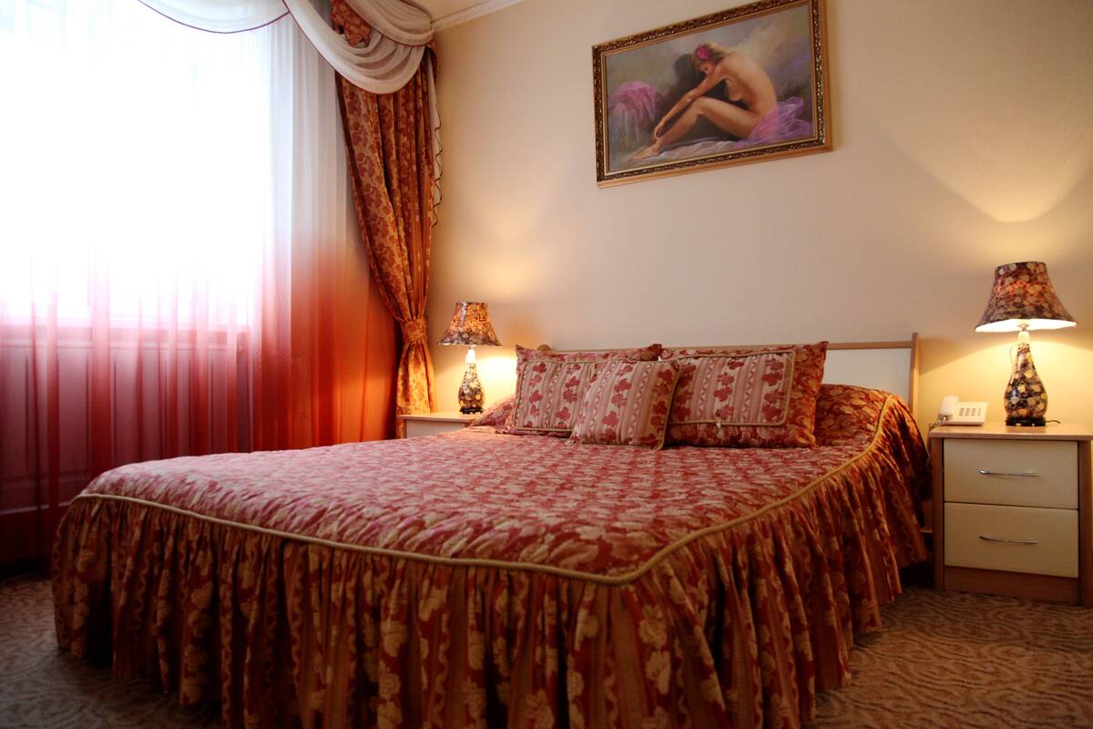 Suite Junior | 1 camera, minibar, una scrivania, ferro/asse da stiro