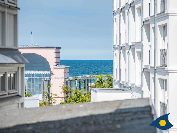 A view of a coastal building with a clear view of the sea.