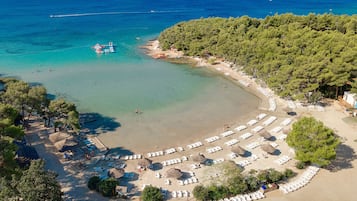 Private beach, white sand, sun-loungers, beach umbrellas